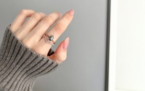 Rose gold wedding set on hand