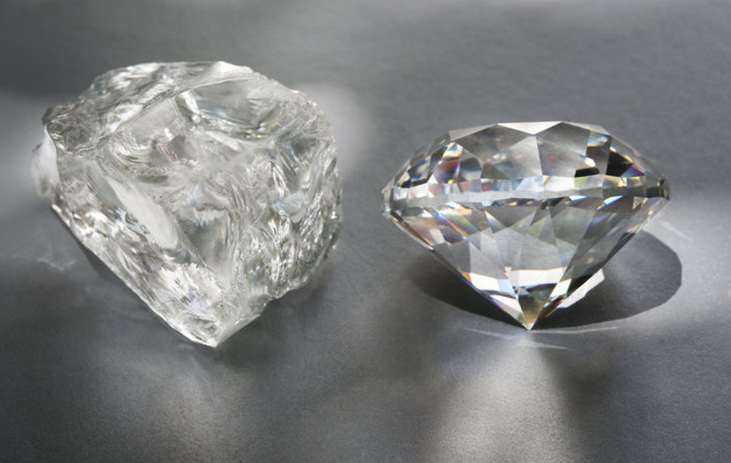 A rough, natural diamond beside a cleanly cut diamond